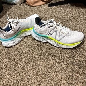 New Balance men’s White and Blue Running Shoes